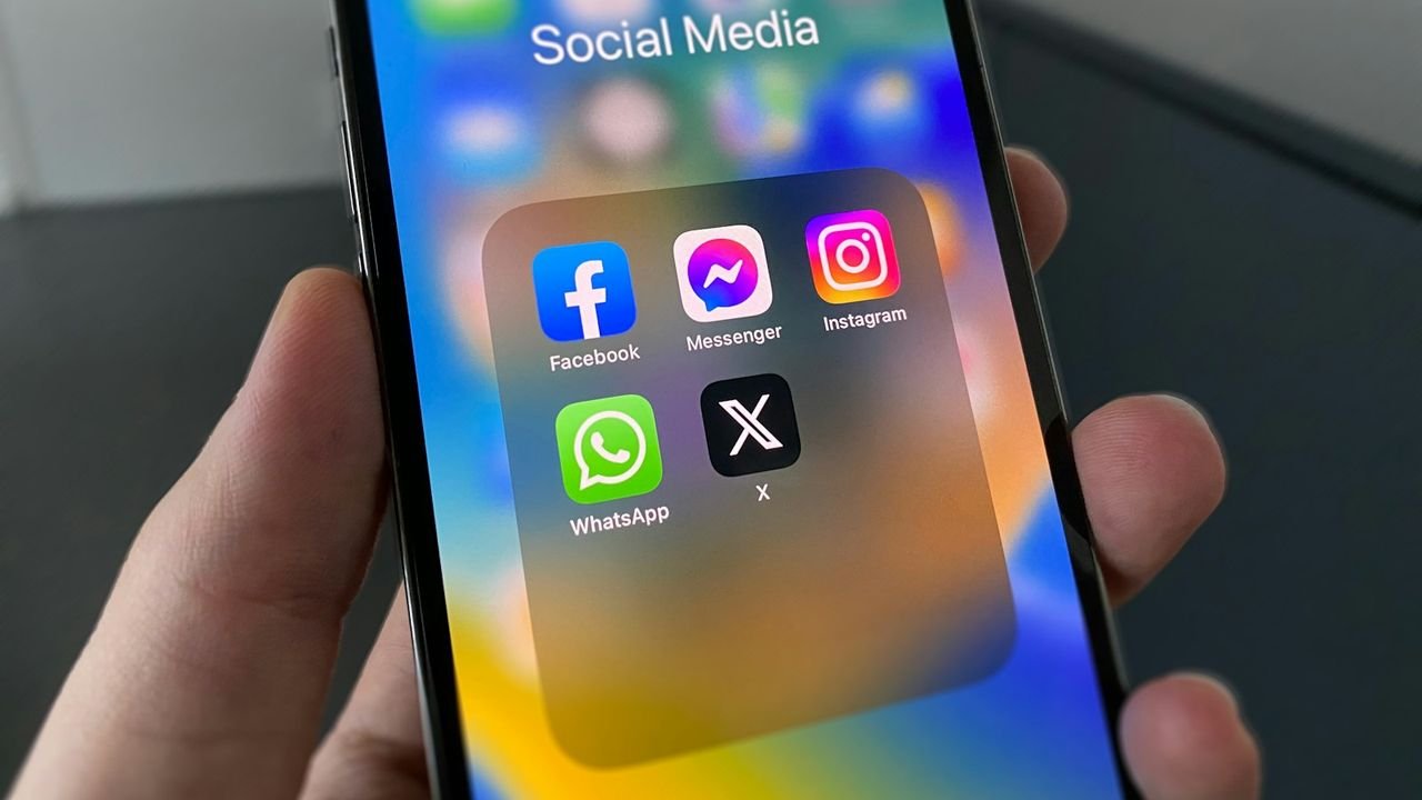 Person scrolling social media on a phone