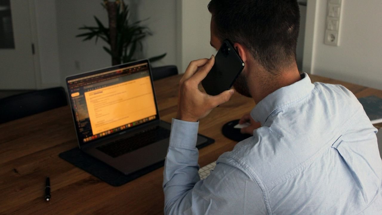 Man checking a missed call on his smartphone
